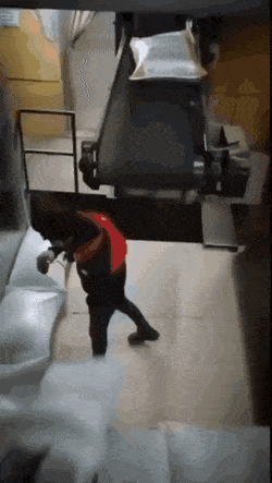 Carrying-sacks-while-drinking-tea.gif