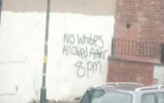 Racist-graffiti-on-wall-1046325.jpg