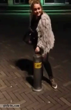 1389635900_girl_makes_pole_disappear.gif