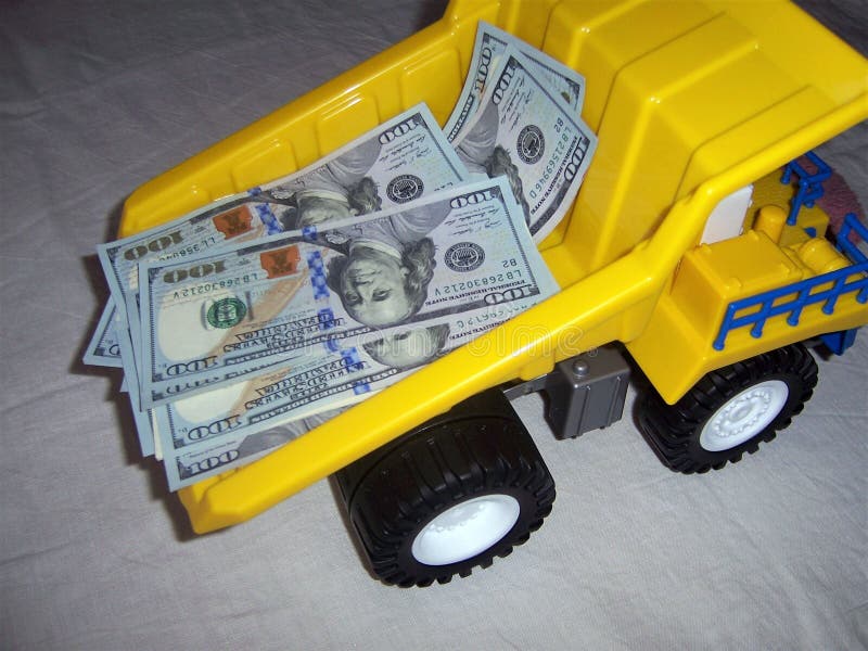 lorry-dump-truck-money-body-dollars-yellow-color-wheel-black-close-up-135414712.jpg