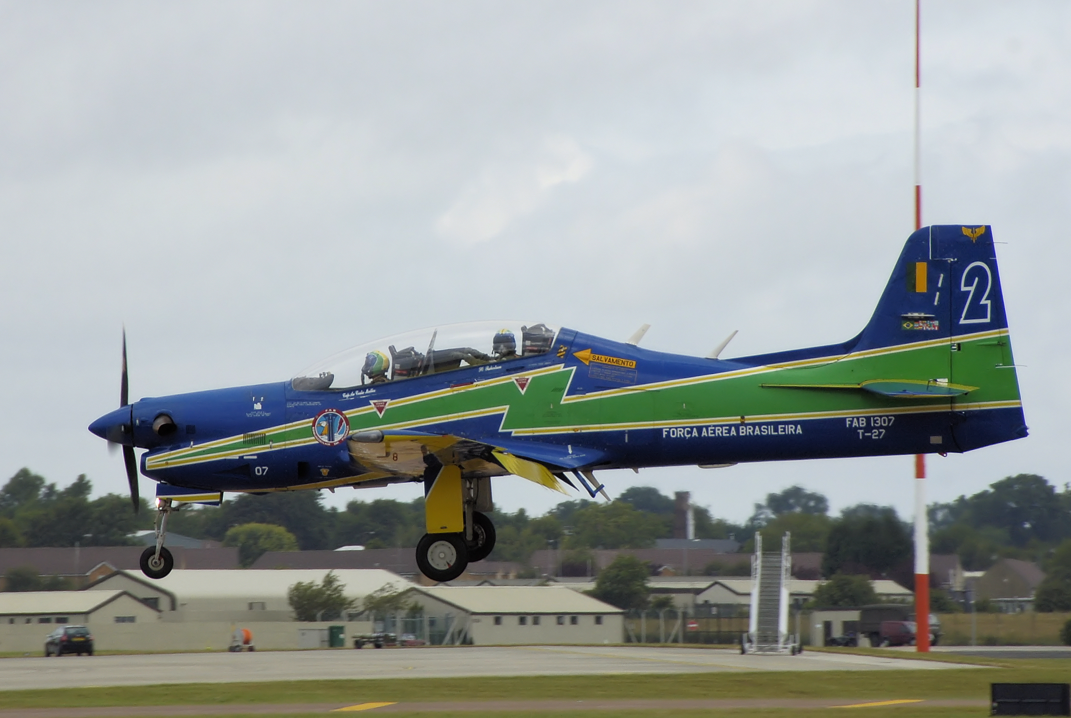 Smoke_squadron_lands_in_tucano_arp.jpg