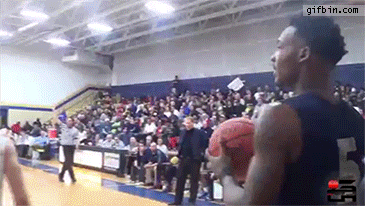 1425317100_basketball_player_bounces_ball_off_opponents_back_to_score.gif