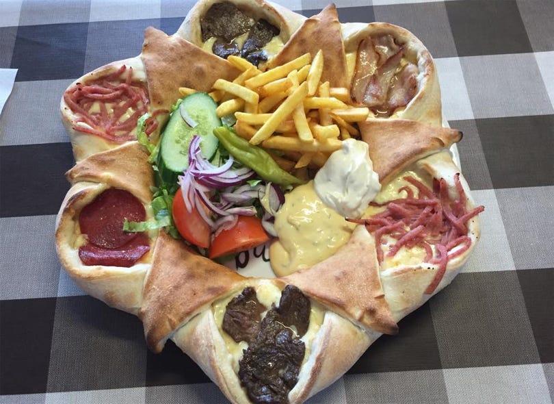 swedes-are-going-crazy-for-this-pizza-volcano-topped-with-4-different-meats-and-fries.jpg