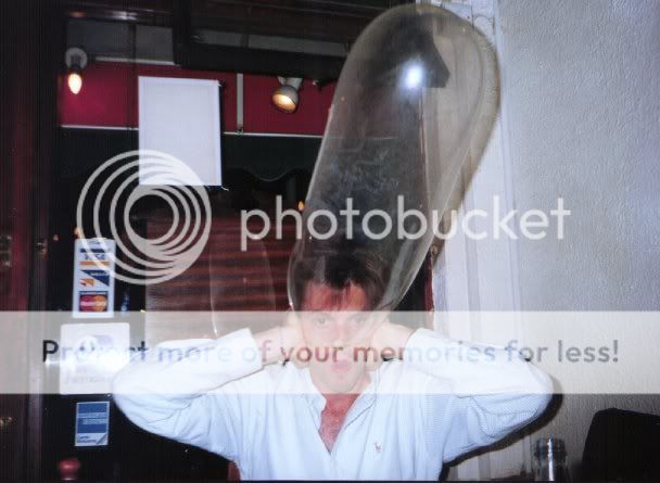 condom-being-inflated-over-mans-hea.jpg