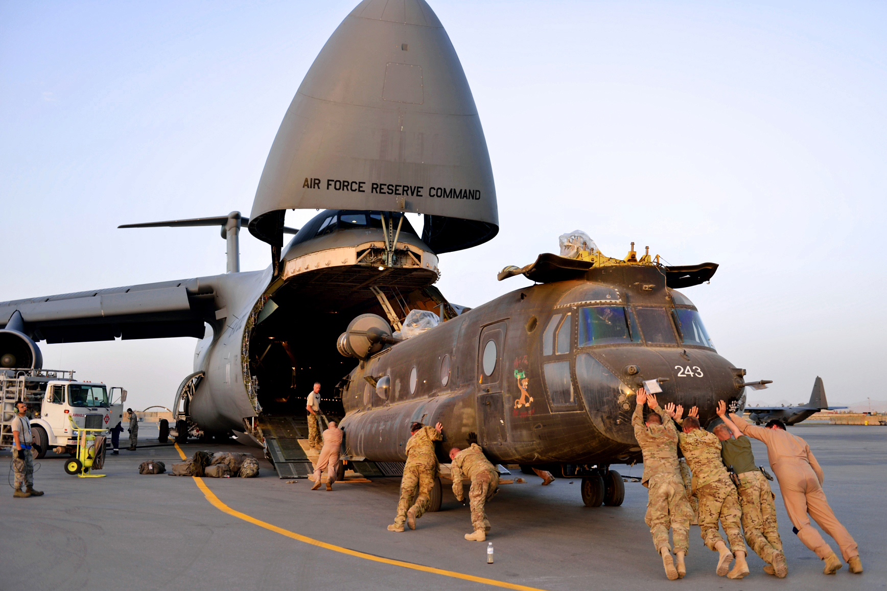 U.S._Army_National_Guard_soldiers_push_a_CH-47_Chinook_helicopter_into_a_U.S._Air_Force_C-5_Galaxy_as_they_prepare_to_return_home_to_the_United_States_following_a_nine-month_deployment_to_Afghanistan_on_April_20_130420-Z-ZZ999-004.jpg