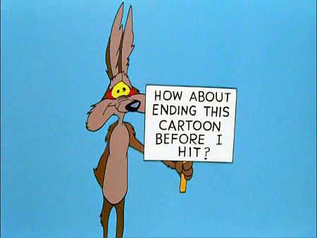 Wile-E.-Coyote-holdign-sign.jpg