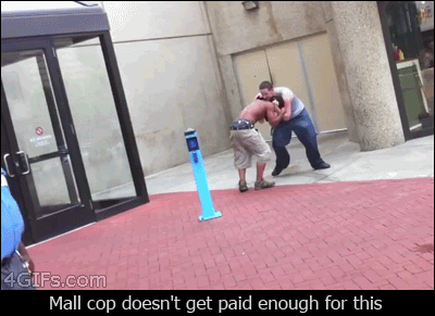 Security-guard-ignores-fight.gif