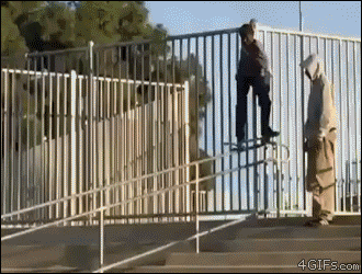 Skateboarder-railing-lamppost.gif