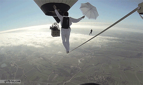 1393789671_daredevil_tightrope_walk_between_two_hotair_balloons.gif