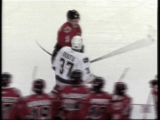 Calgary-Flames-Player-Throws-Off-Gloves-and-Falls-Backwards.gif