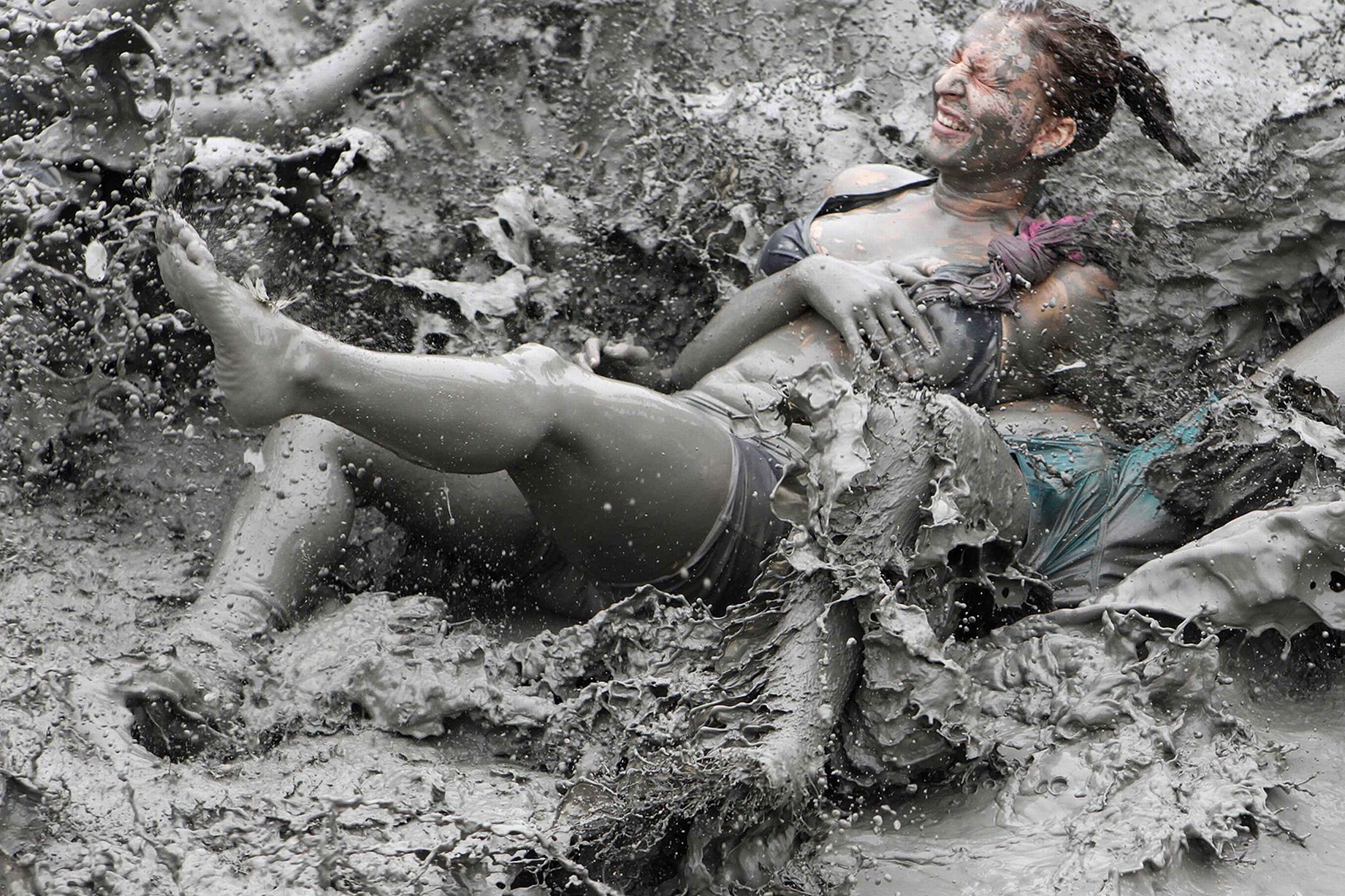 Tourists-play-in-mud-during-the-opening-day-of-the-Boryeong-Mud-Festival-at-Daecheon-beach-in-Boryeong.jpeg